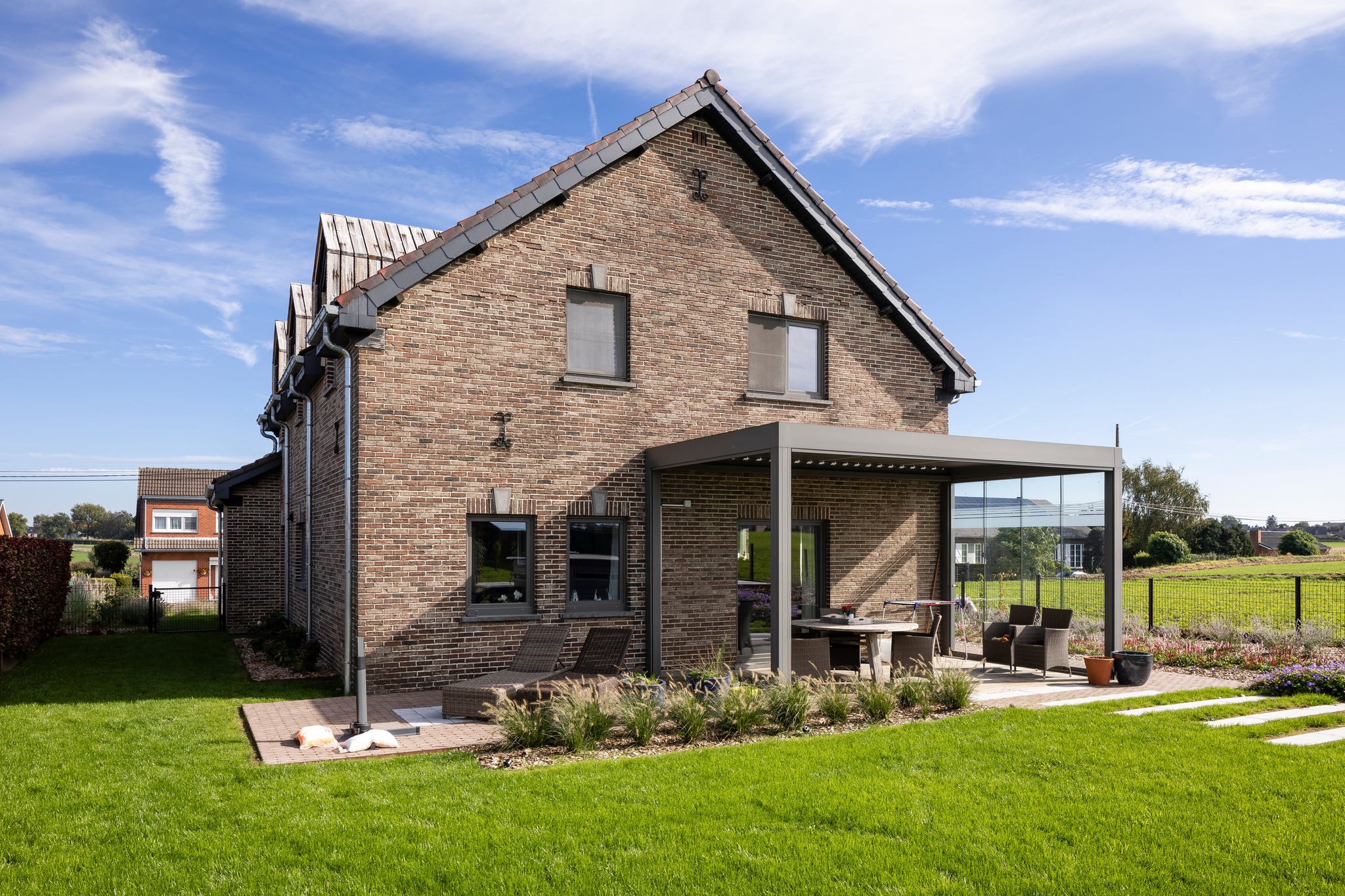 louver pergola with side sliding glass doors